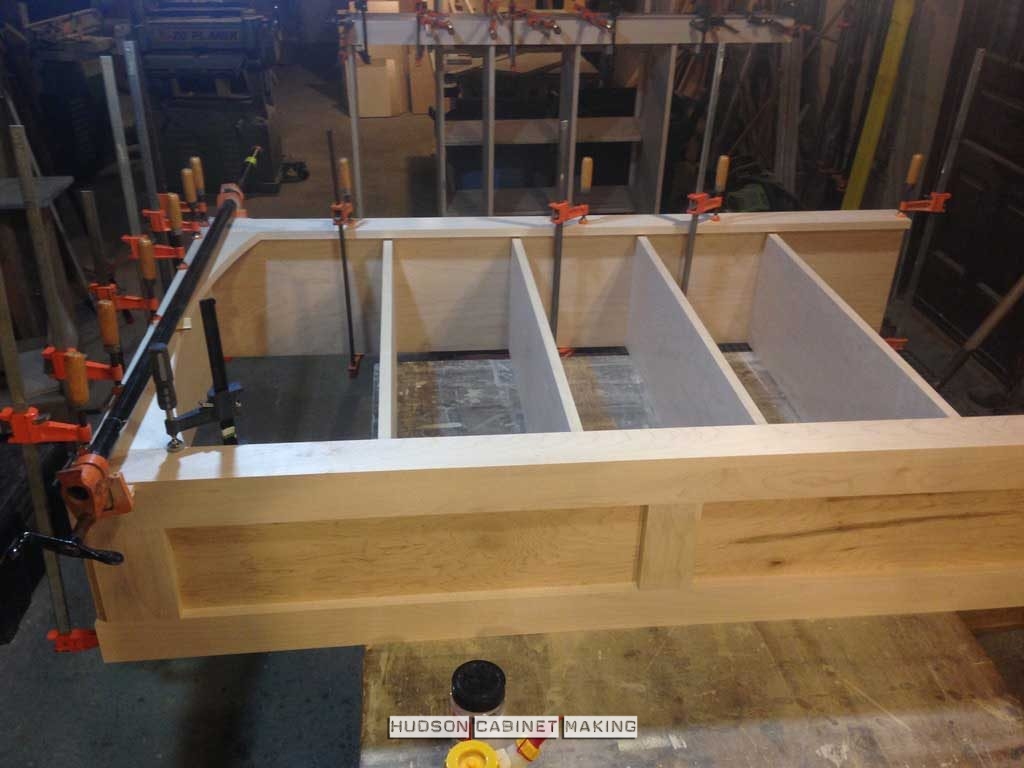 cabinet shelving being glued together